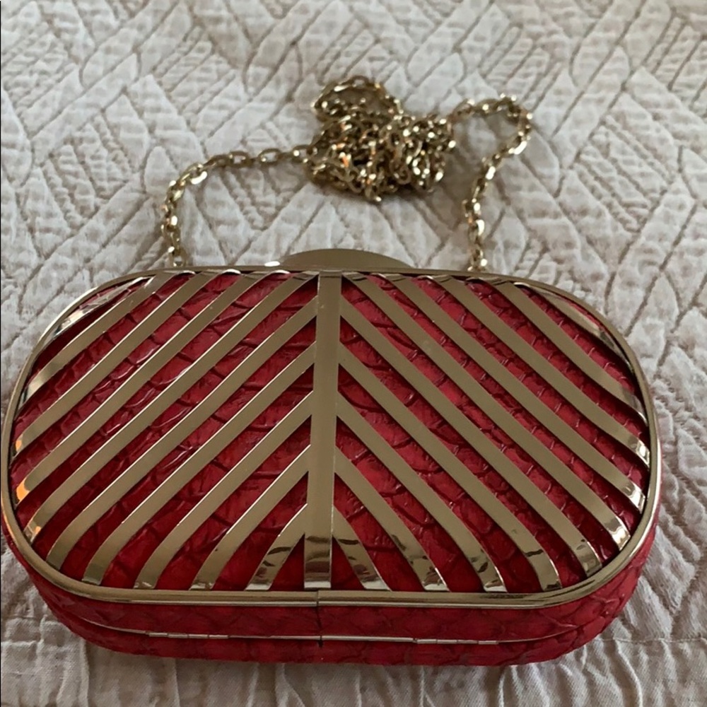 Red with gold clutch.